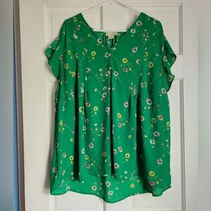 Green floral blouse
